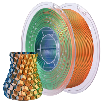 Spool of green, blue and orange filament with a 3D printed sample object