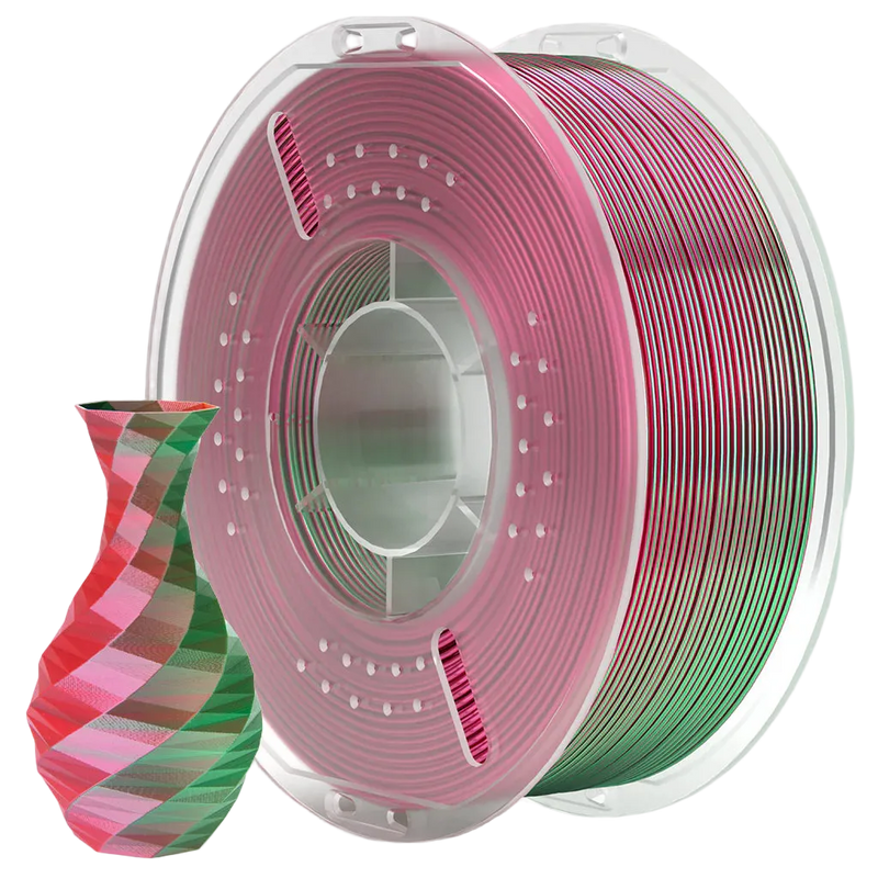 Spool of red and green filament with a sample model