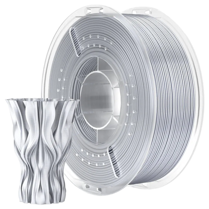 Spool of silver filament and a 3D printed vase