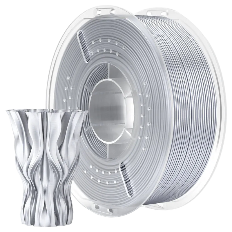 Spool of silver filament and a 3D printed vase